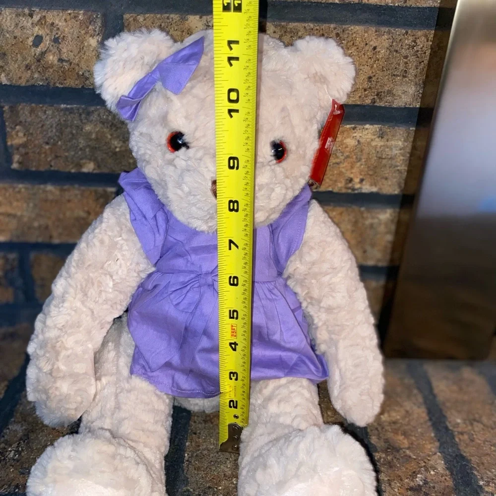 FAO Schwarz bear stuffed animal. 2016 Geoffrey, Purple dress and bow. - Picture 4 of 7